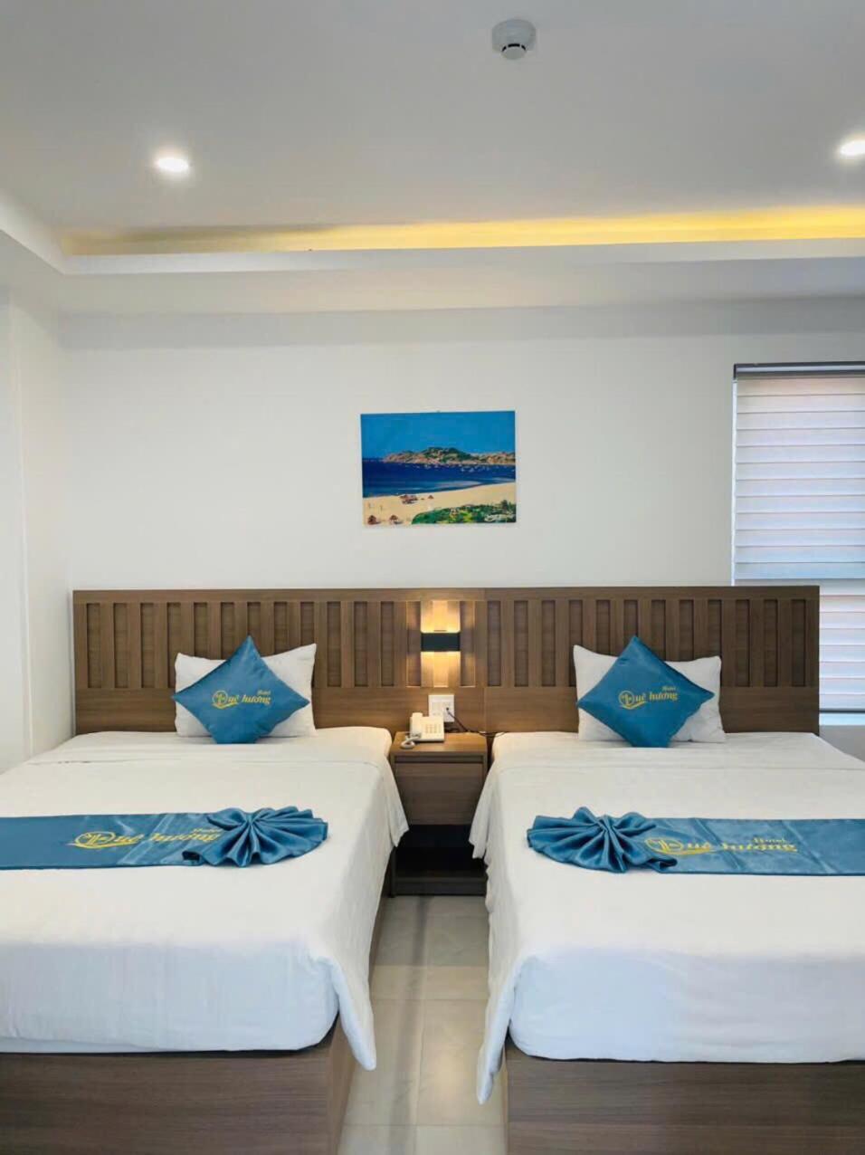 Que Huong Hotel Куинён Экстерьер фото